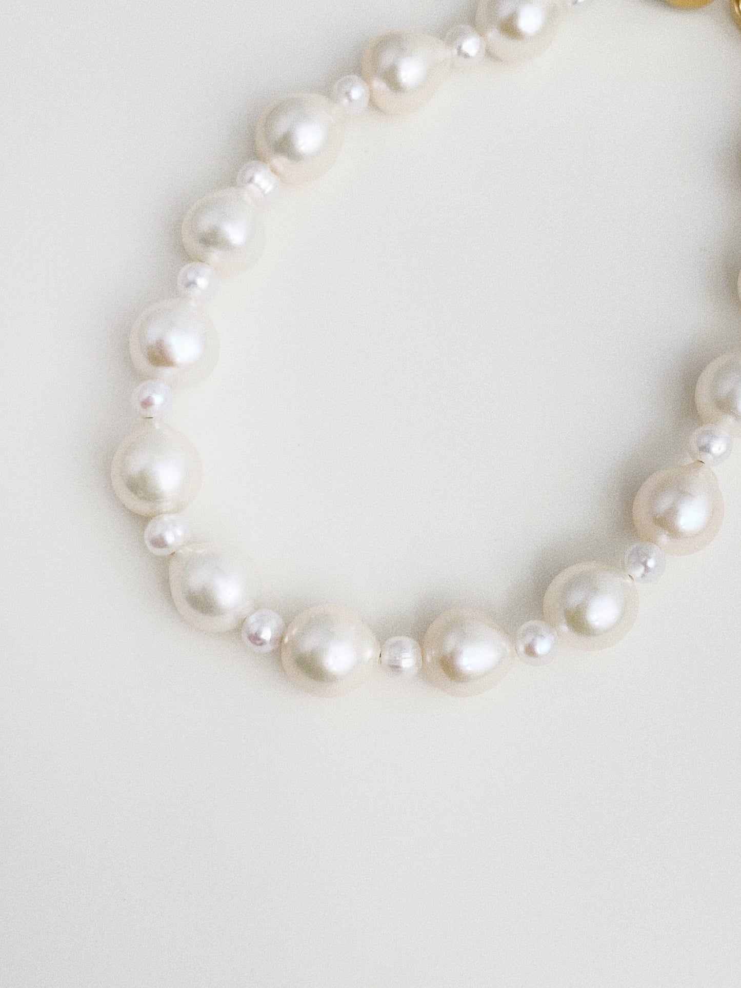 Macro detail of genuine freshwater Keshi baroque pearls with soft white nacre