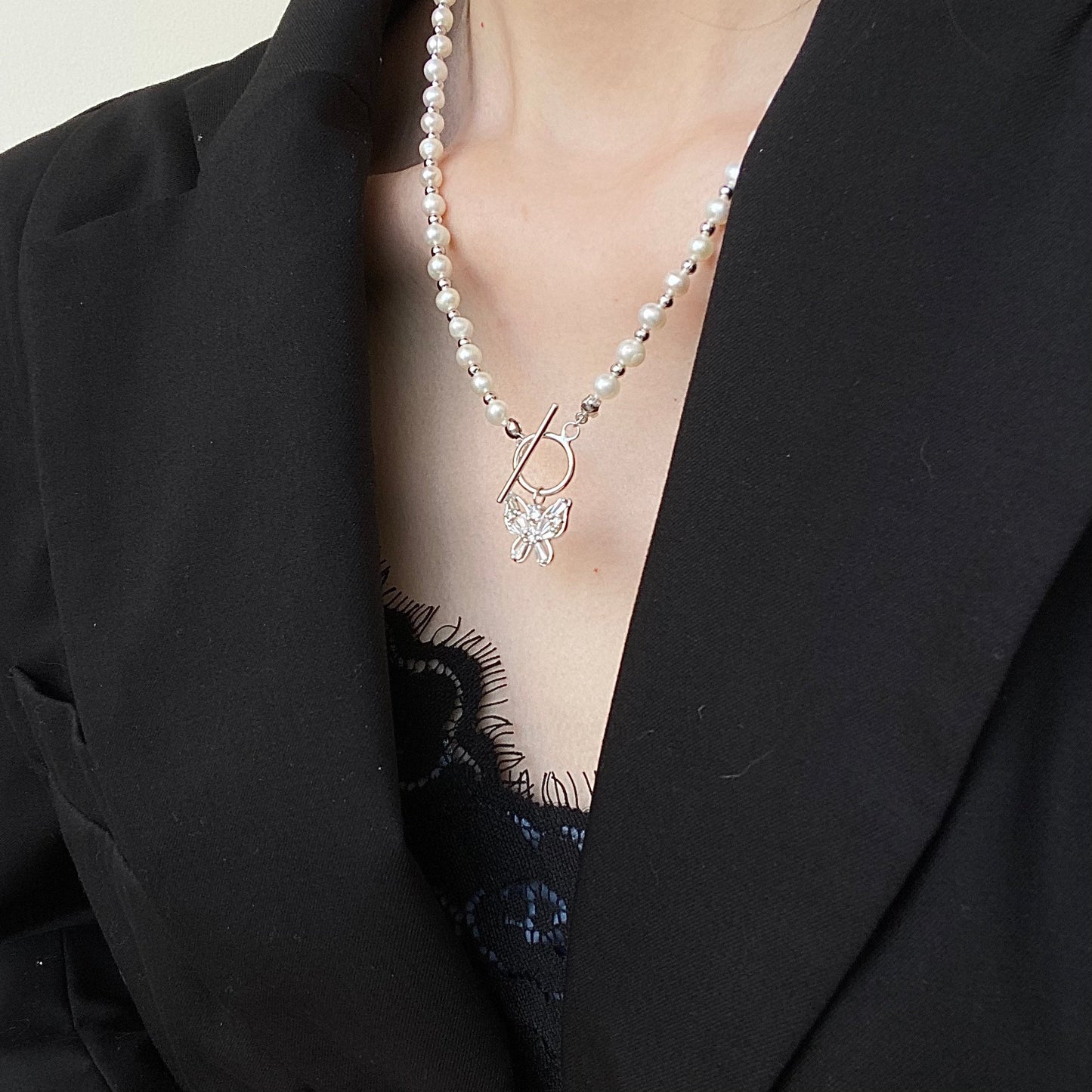 Elegant Pearl Cascade S925 Silver Butterfly Necklace