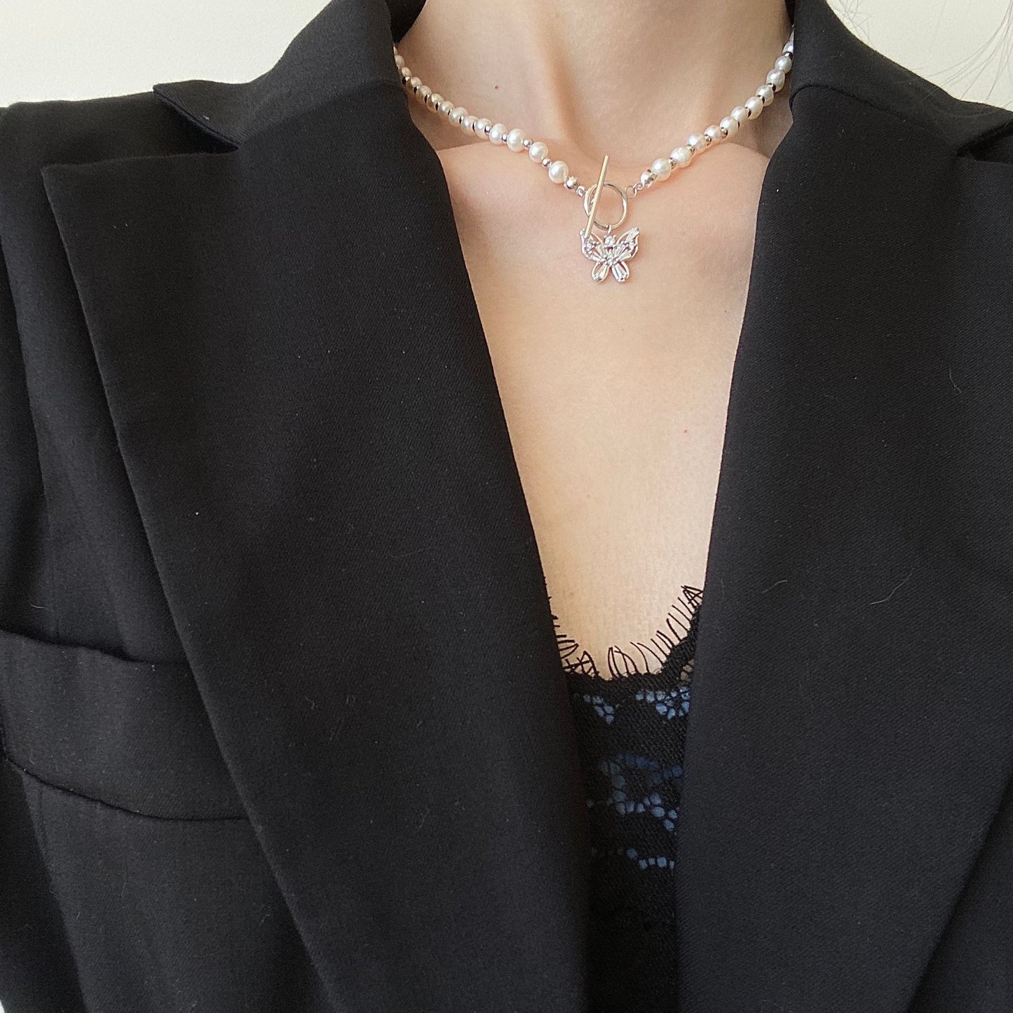 Elegant Pearl Cascade S925 Silver Butterfly Necklace