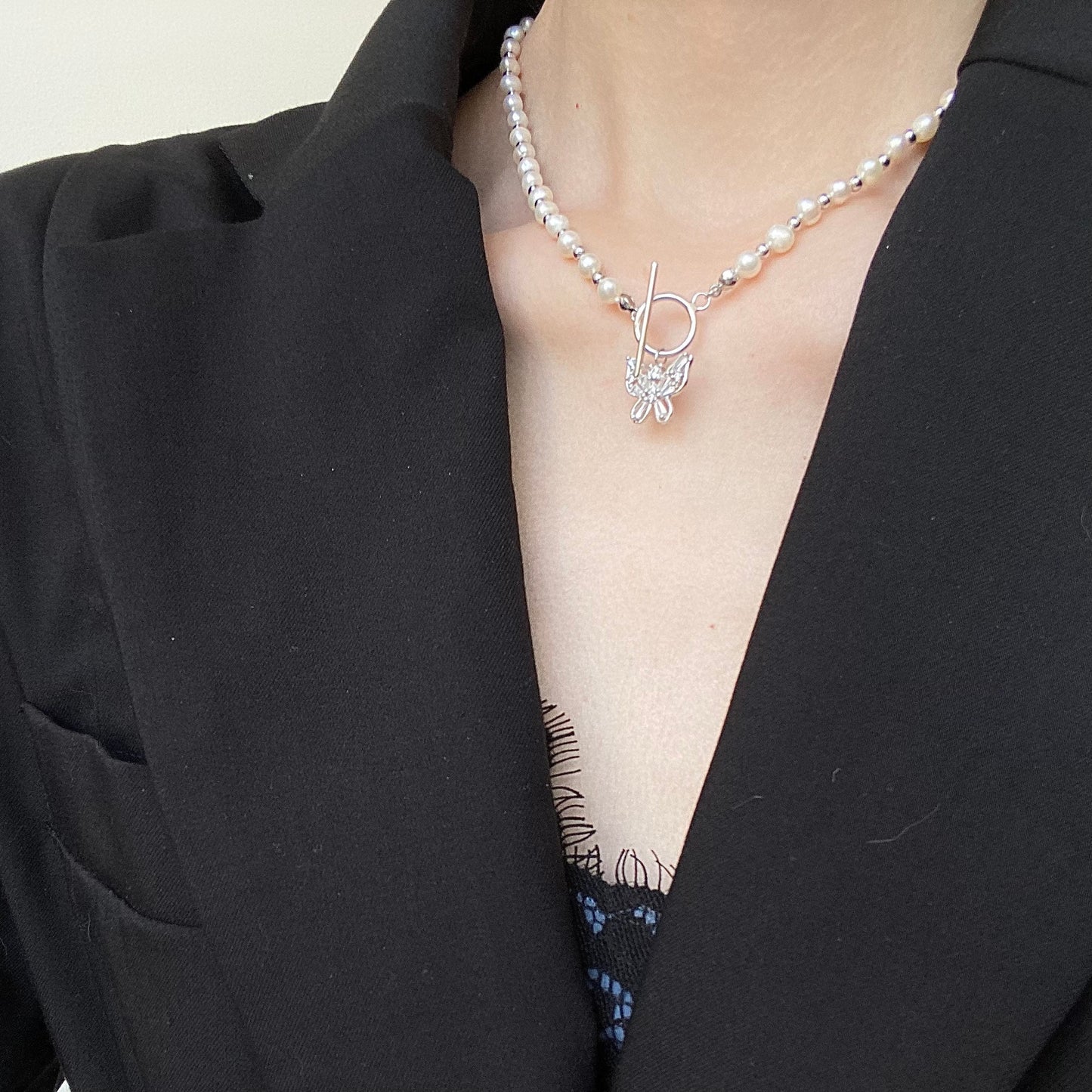 Elegant Pearl Cascade S925 Silver Butterfly Necklace