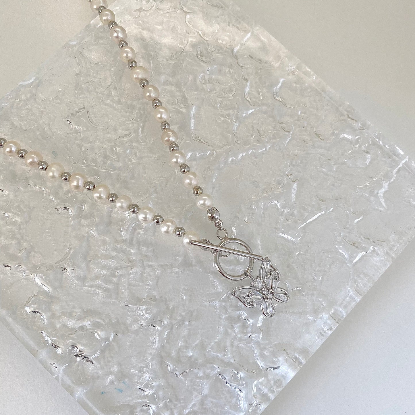 Elegant Pearl Cascade S925 Silver Butterfly Necklace