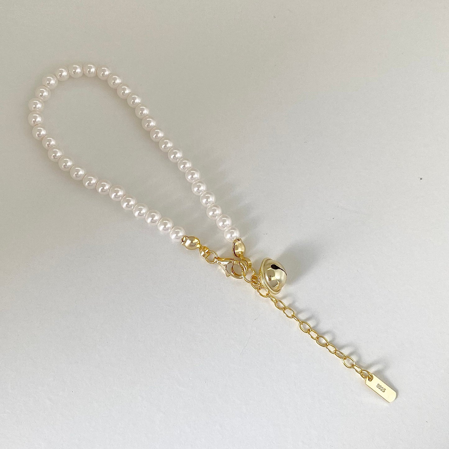 Pearl Melody Swarovski Pearl Bracelet with Gold Bell Charm