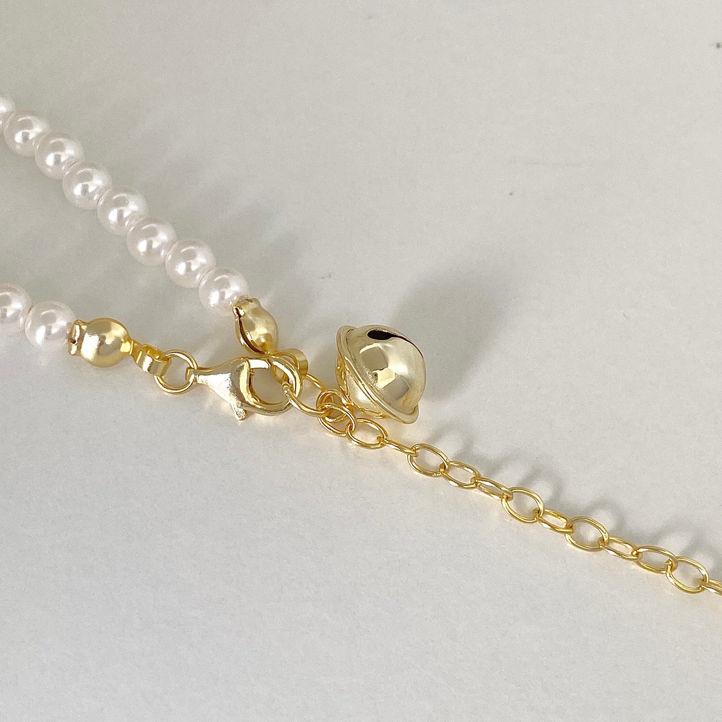 Pearl Melody Swarovski Pearl Bracelet with Gold Bell Charm