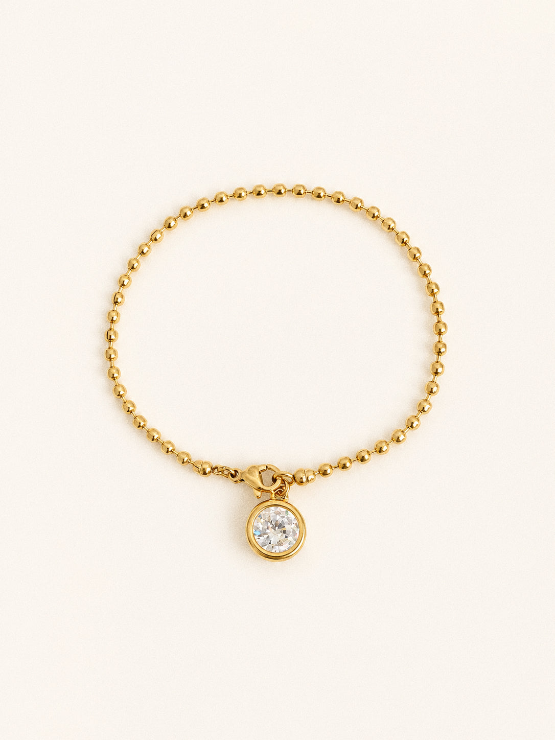 The ball chain bracelet from the Aura jewellery set with its bezel set cubic zirconia charm