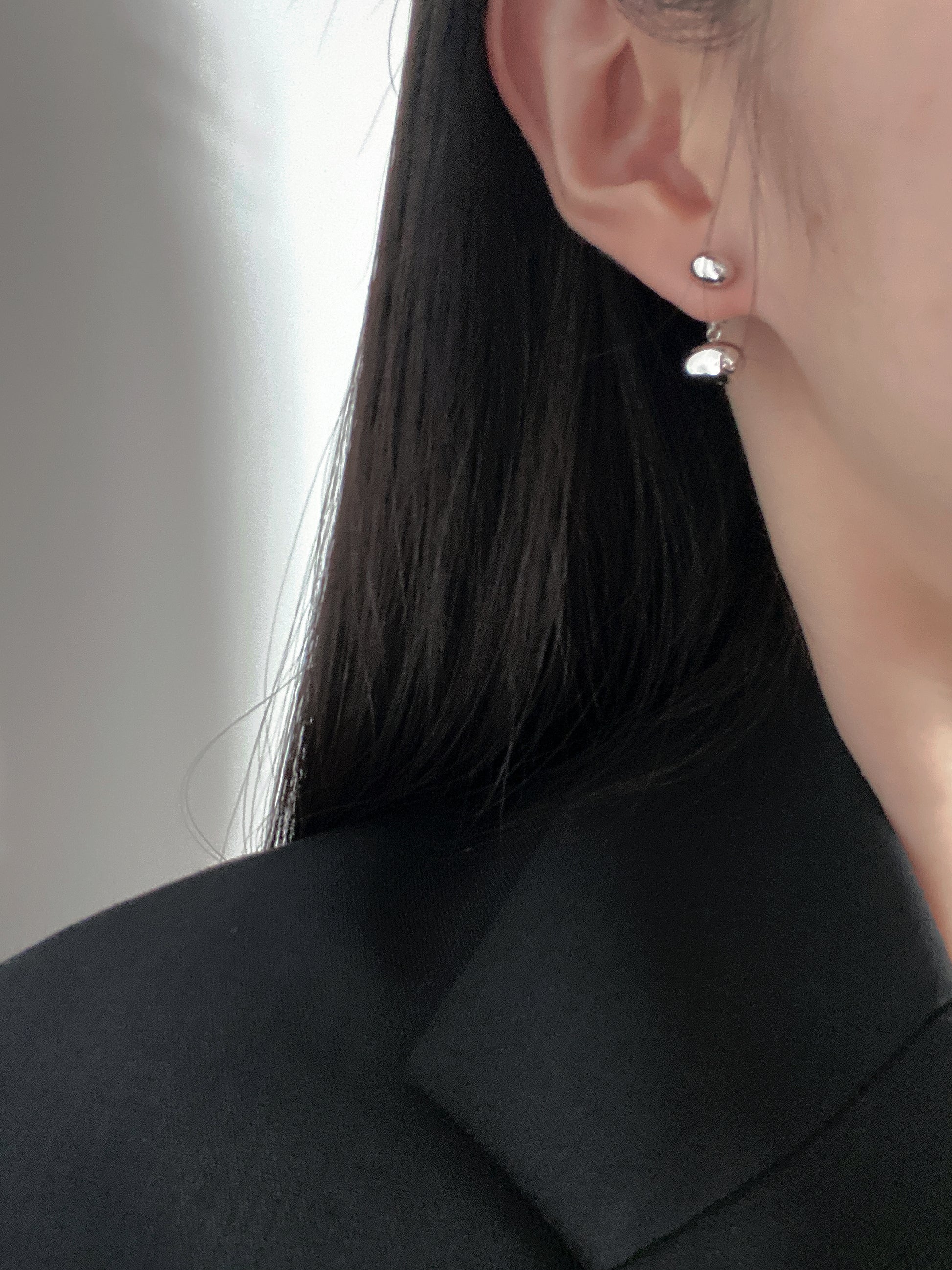 beaded earrings on a model