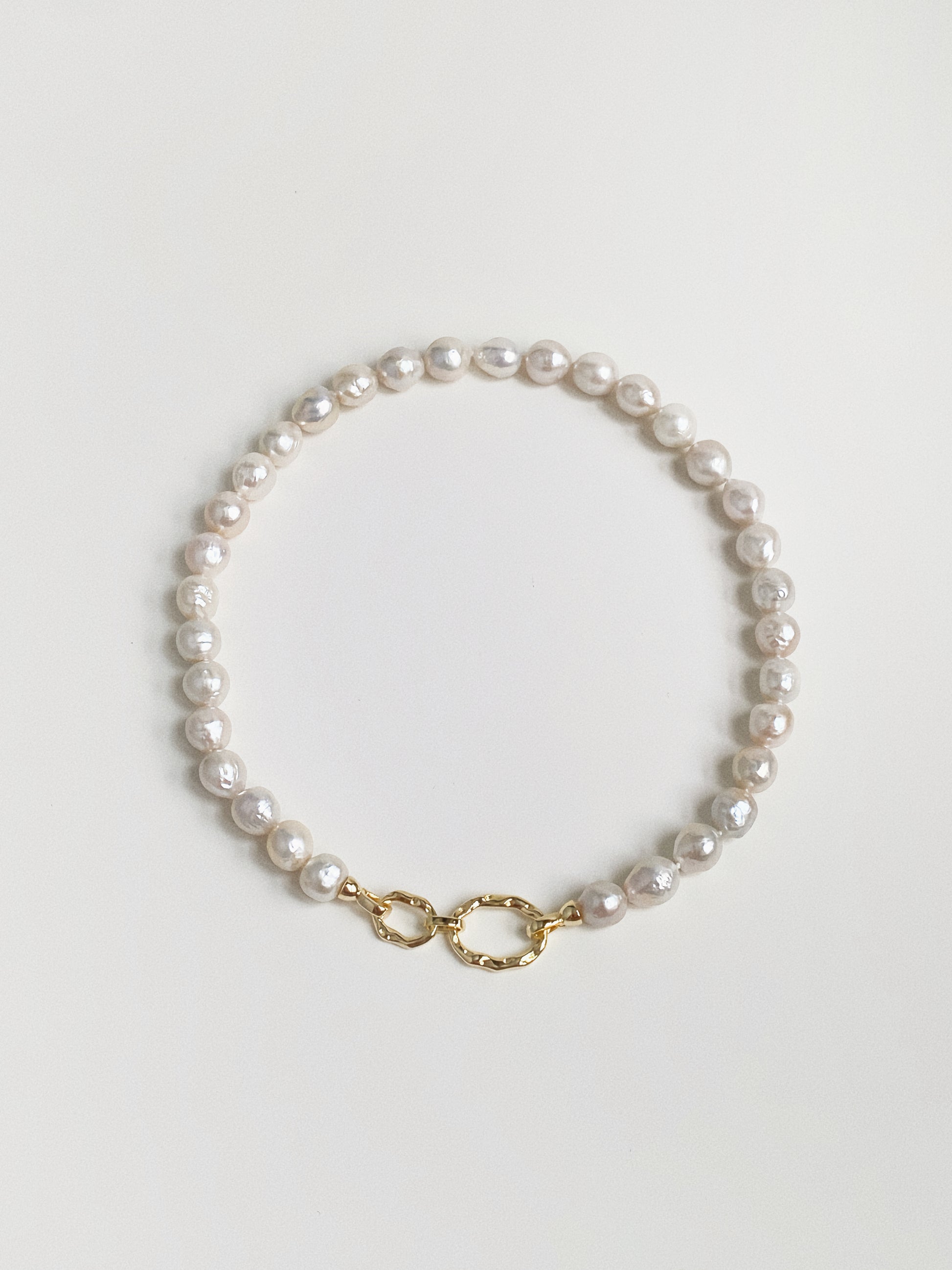 Chunky 9-11mm baroque pearl necklace at 45cm princess length shown flat with gold front clasp