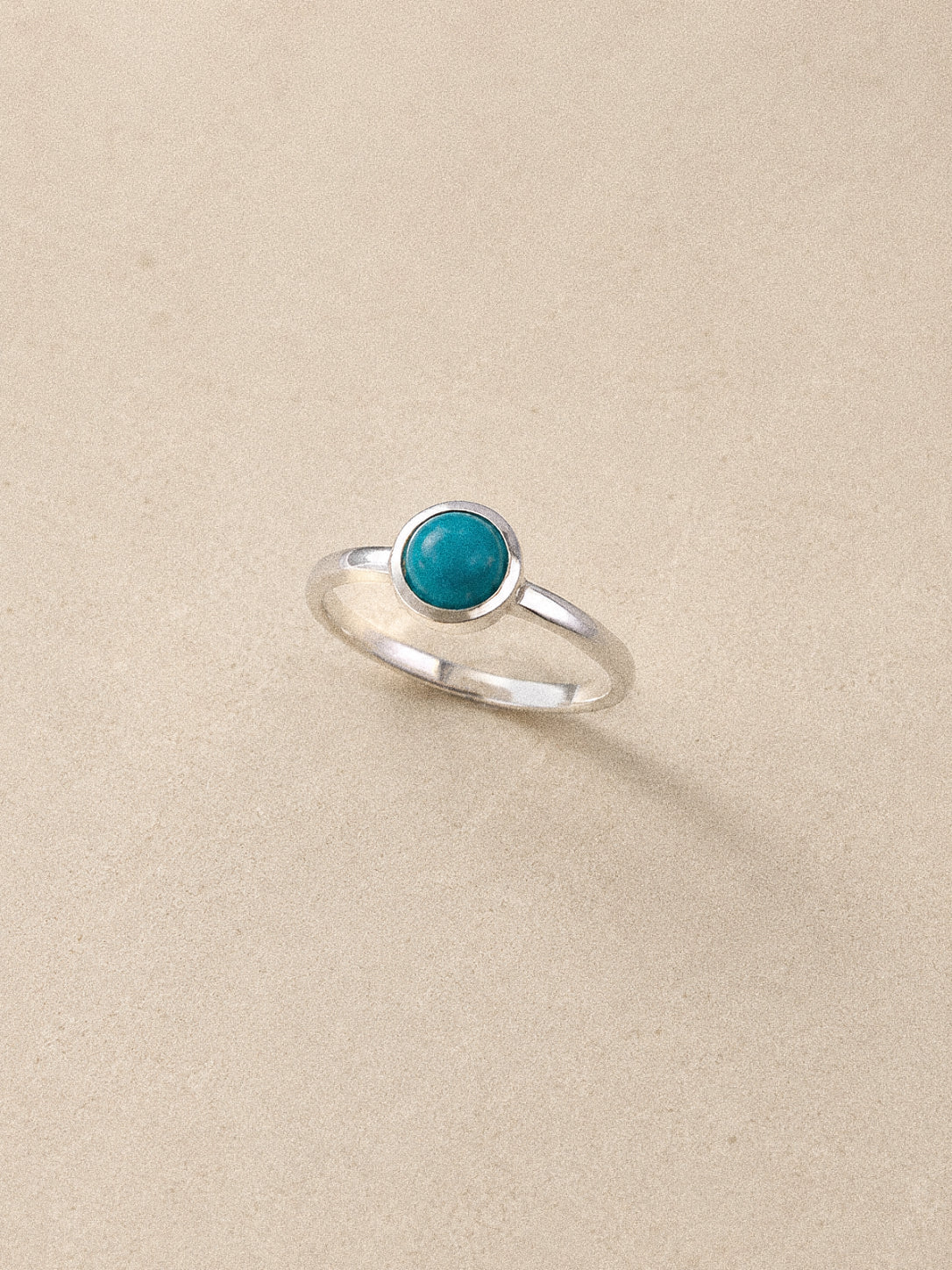 Cove Sleeping Beauty turquoise ring in 925 sterling silver with a round 5 mm natural stone and polished bezel.