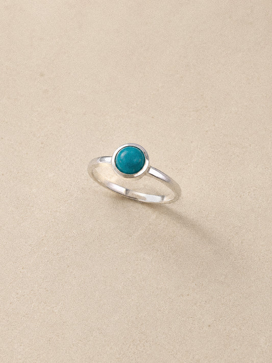 Cove Sleeping Beauty turquoise ring in 925 sterling silver with a round 5 mm natural stone and polished bezel.