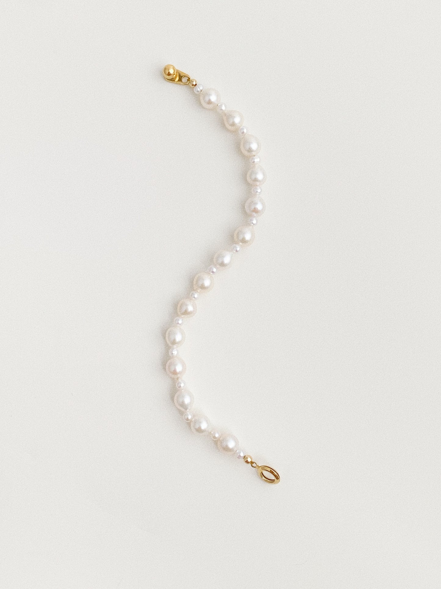 17cm dainty Keshi pearl bracelet laid flat showing gold-plated hook and ring clasp