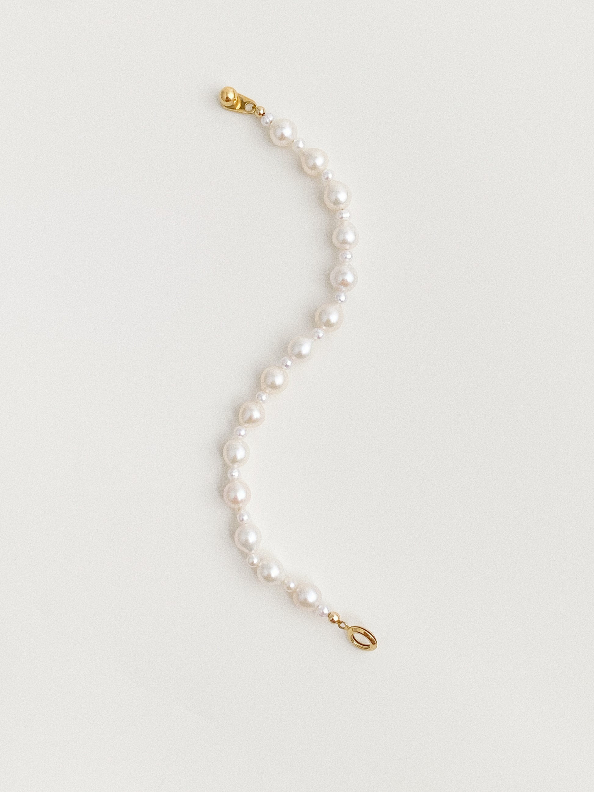17cm dainty Keshi pearl bracelet laid flat showing gold-plated hook and ring clasp