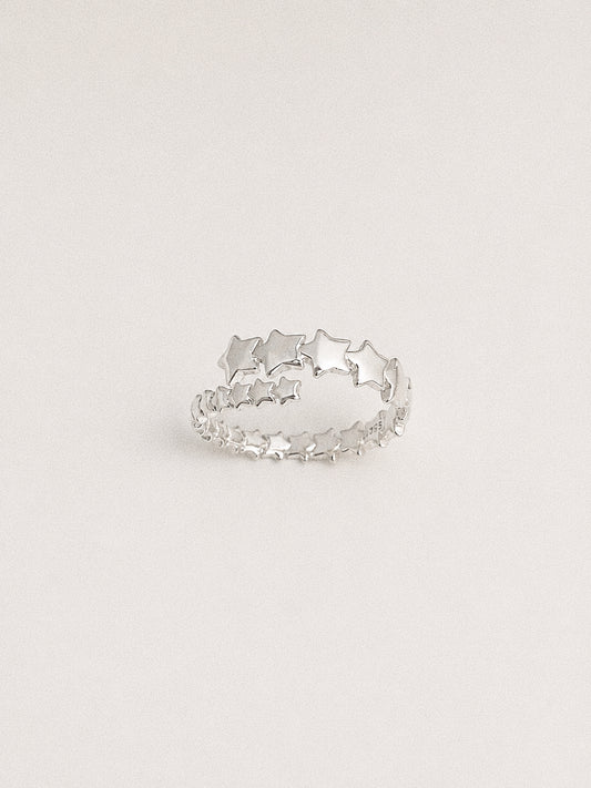 Drift dainty multi star ring in 925 sterling silver, with two rows of polished stars growing towards the centre.