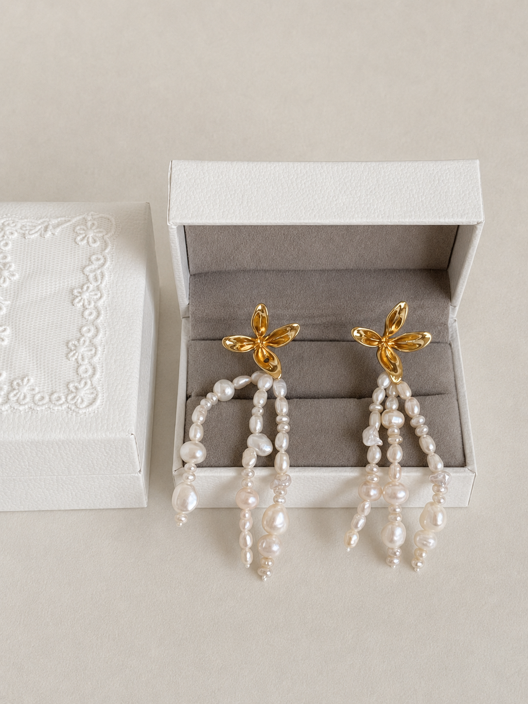 Fleur freshwater pearl tassel earrings presented as a pair in a Deja vu Jewellery gift box.