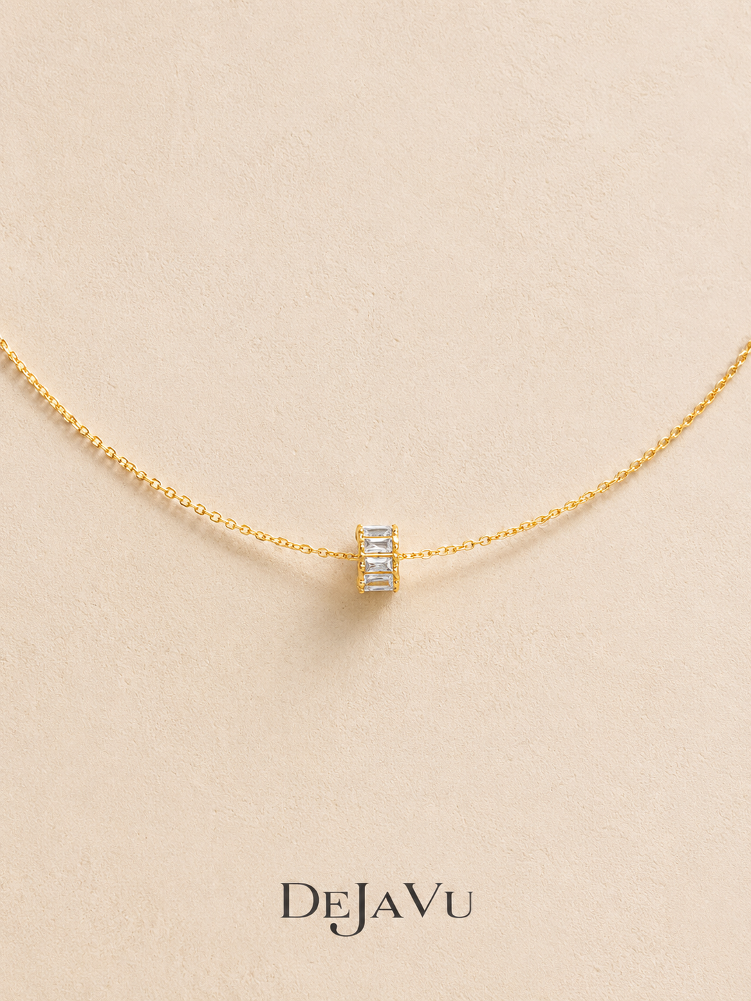 Dainty gold necklace with a tiny baguette zircon spinning wheel charm pendant, waterproof titanium steel by Deja Vu