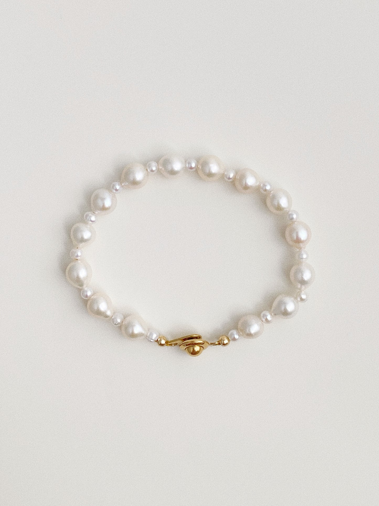 Dainty Keshi pearl bracelet with gold-plated hook clasp by Deja Vu Jewellery