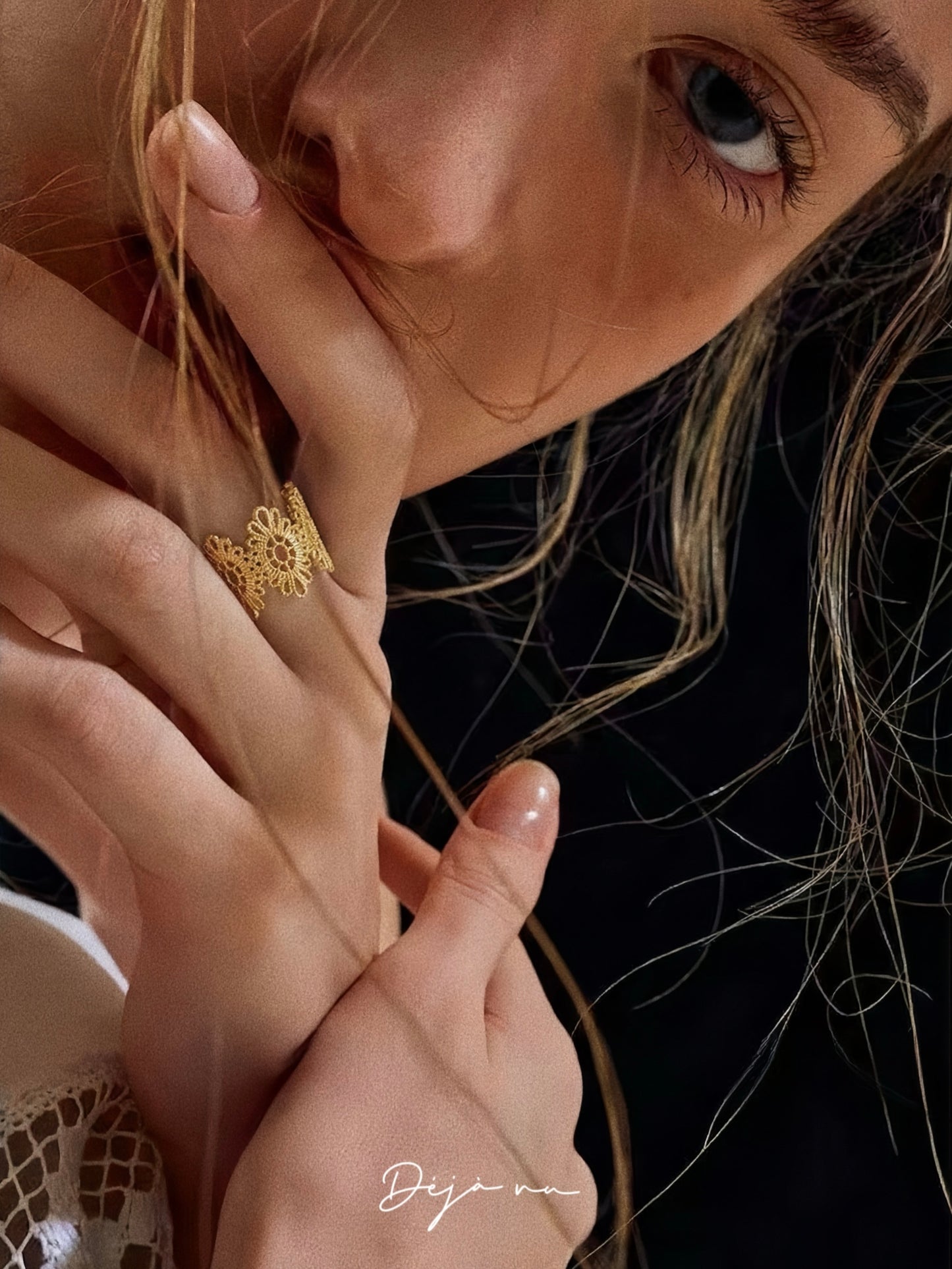 Gold vintage lace floral ring styled on model in soft romantic editorial shot by Deja Vu Jewellery