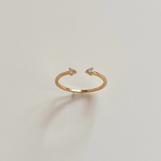Front view of Duo Sparkle dainty gold pinky ring standing upright