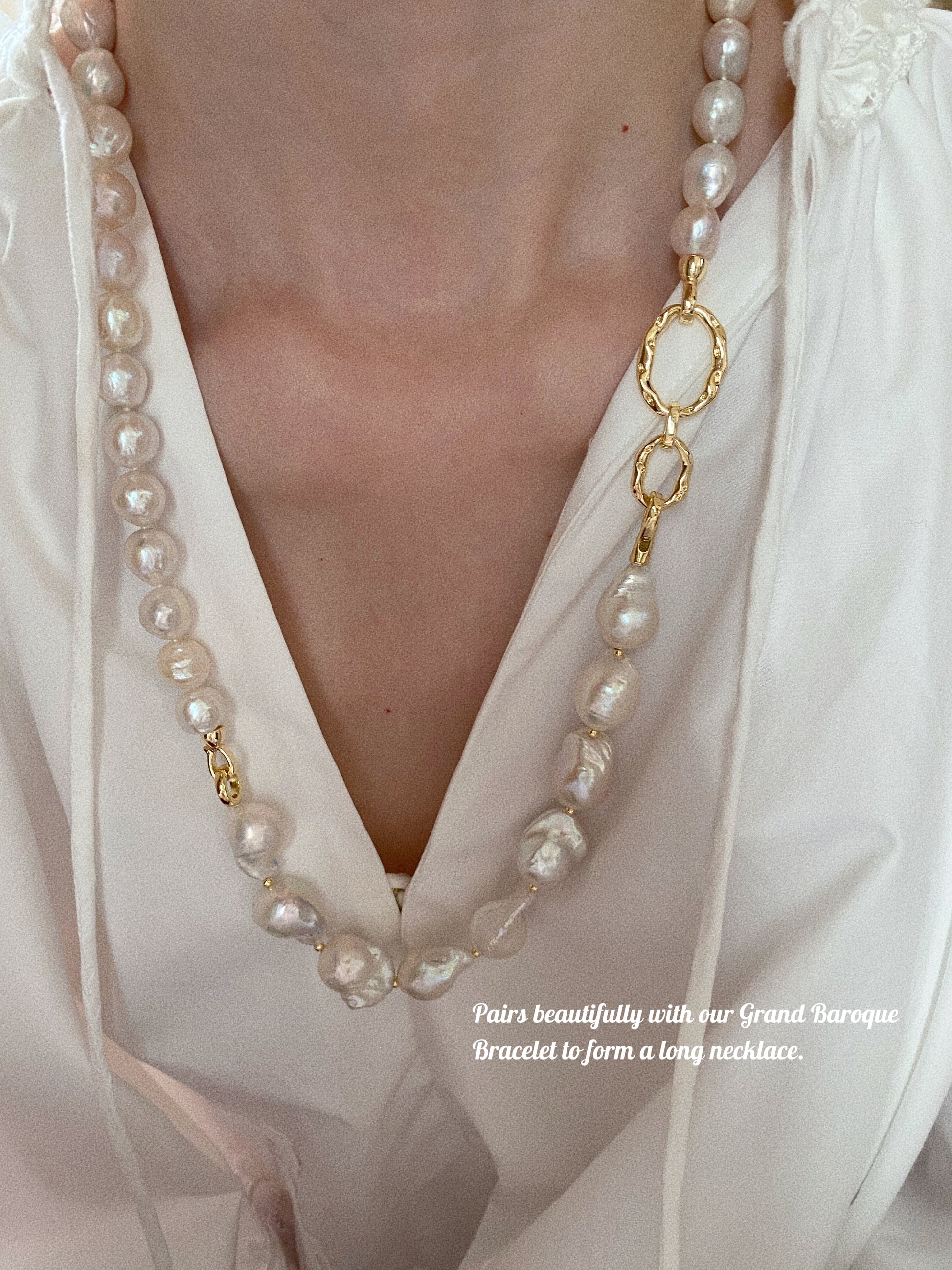 Grand Baroque pearl necklace paired with Grand Baroque pearl bracelet creating a long layered necklace look