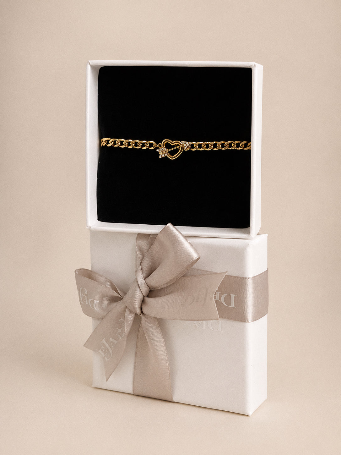 Cupid heart toggle bracelet presented in a white Deja Vu Jewellery gift box with ribbon