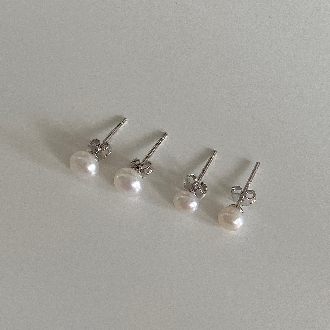 Timeless Elegance Sterling Silver Pearl Stud Earrings in two sizes