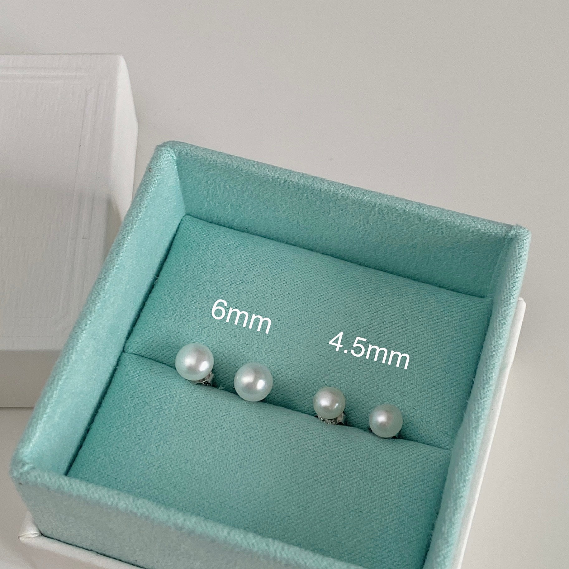 Timeless Elegance Sterling Silver Pearl Stud Earrings in two sizes in package box