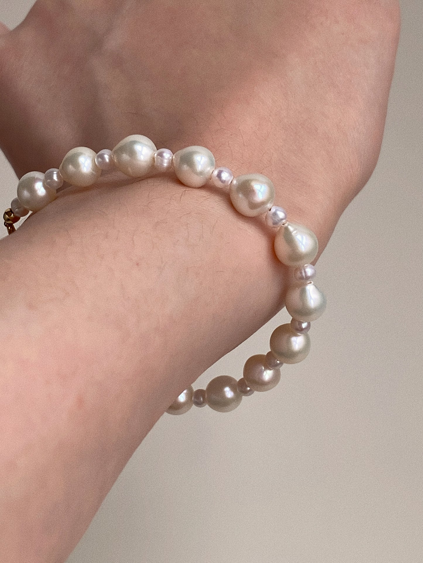 Keshi baroque pearl bracelet worn on wrist for everyday stacking and minimalist styling
