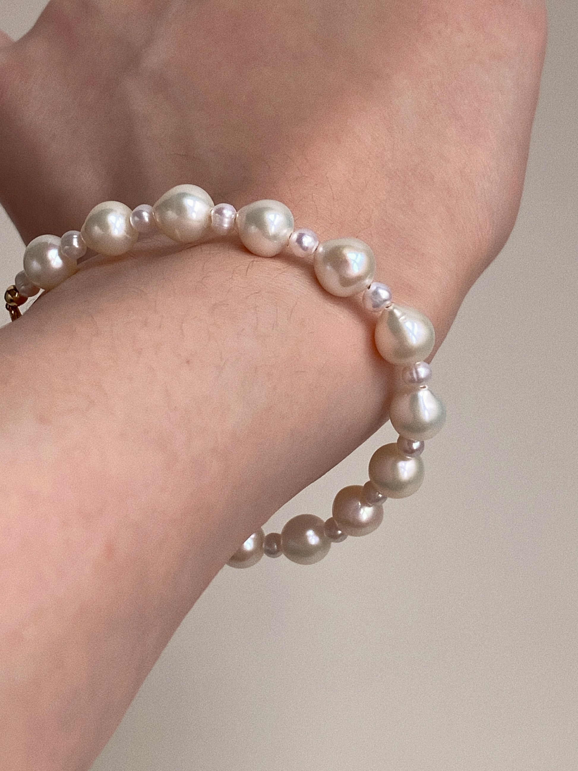 Keshi baroque pearl bracelet worn on wrist for everyday stacking and minimalist styling