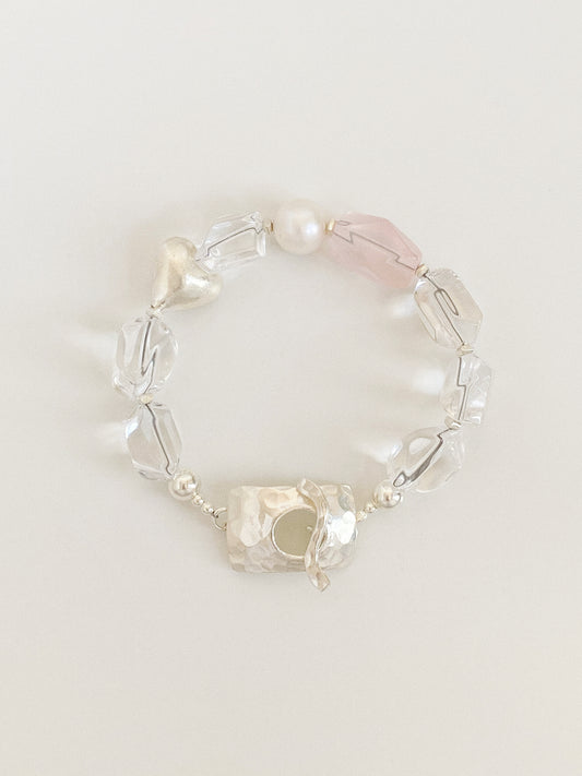 Handmade bracelet of chunky faceted clear quartz nuggets, rose quartz, freshwater pearl and a brushed silver heart with a hammered 925 clasp