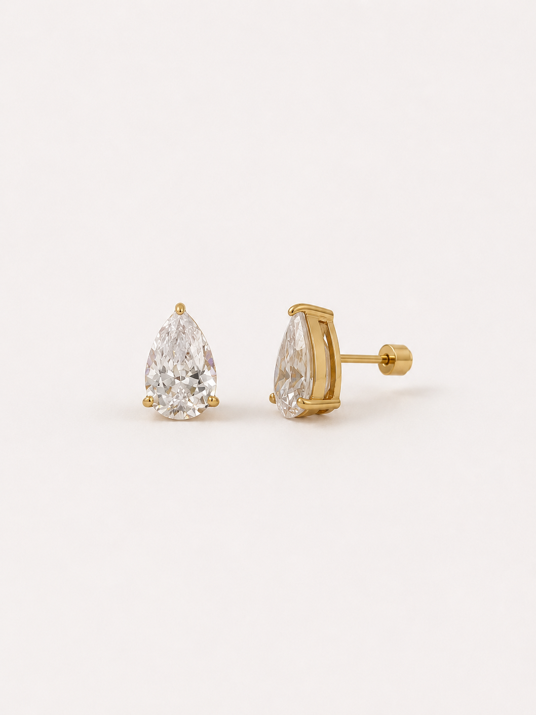Dew pear stud earrings with claw set teardrop cubic zirconia and screw backs in 18k gold plated steel