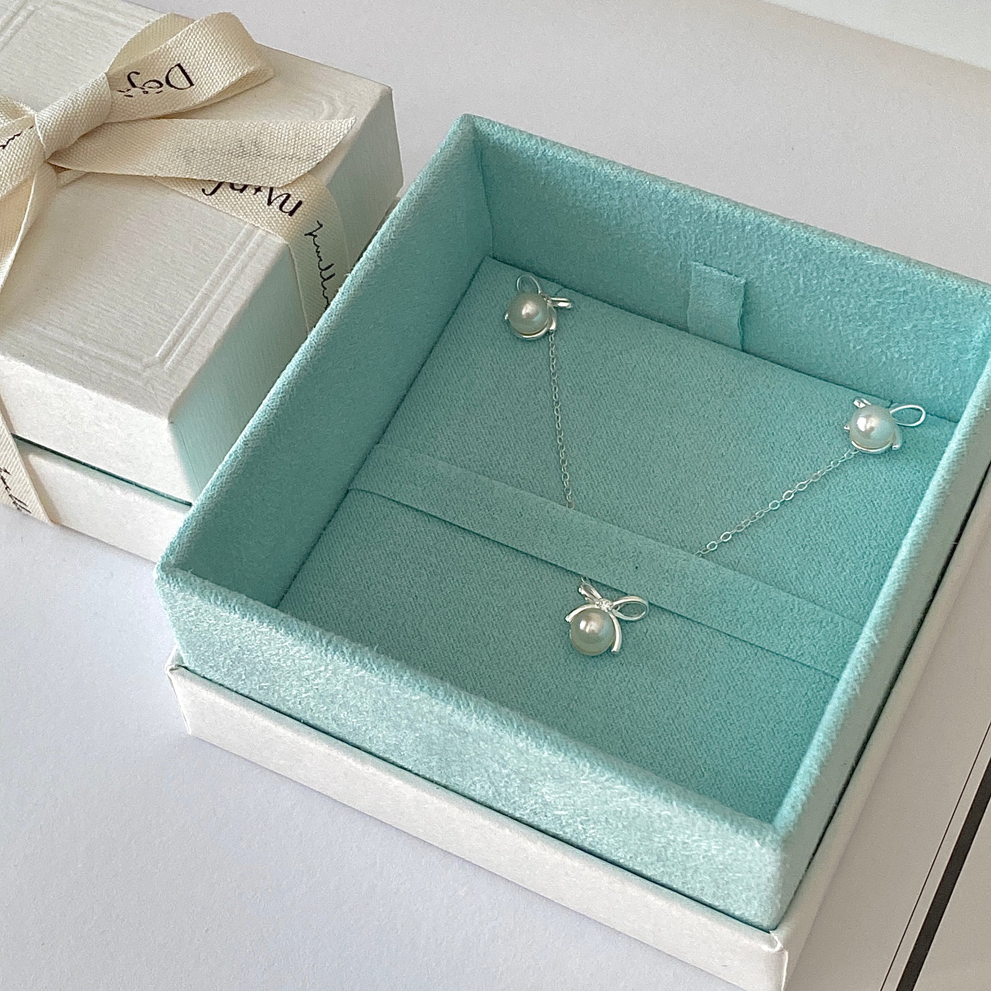 Sterling-silver bow pearl stud earrings, 6 mm shell pearls, minimalist design