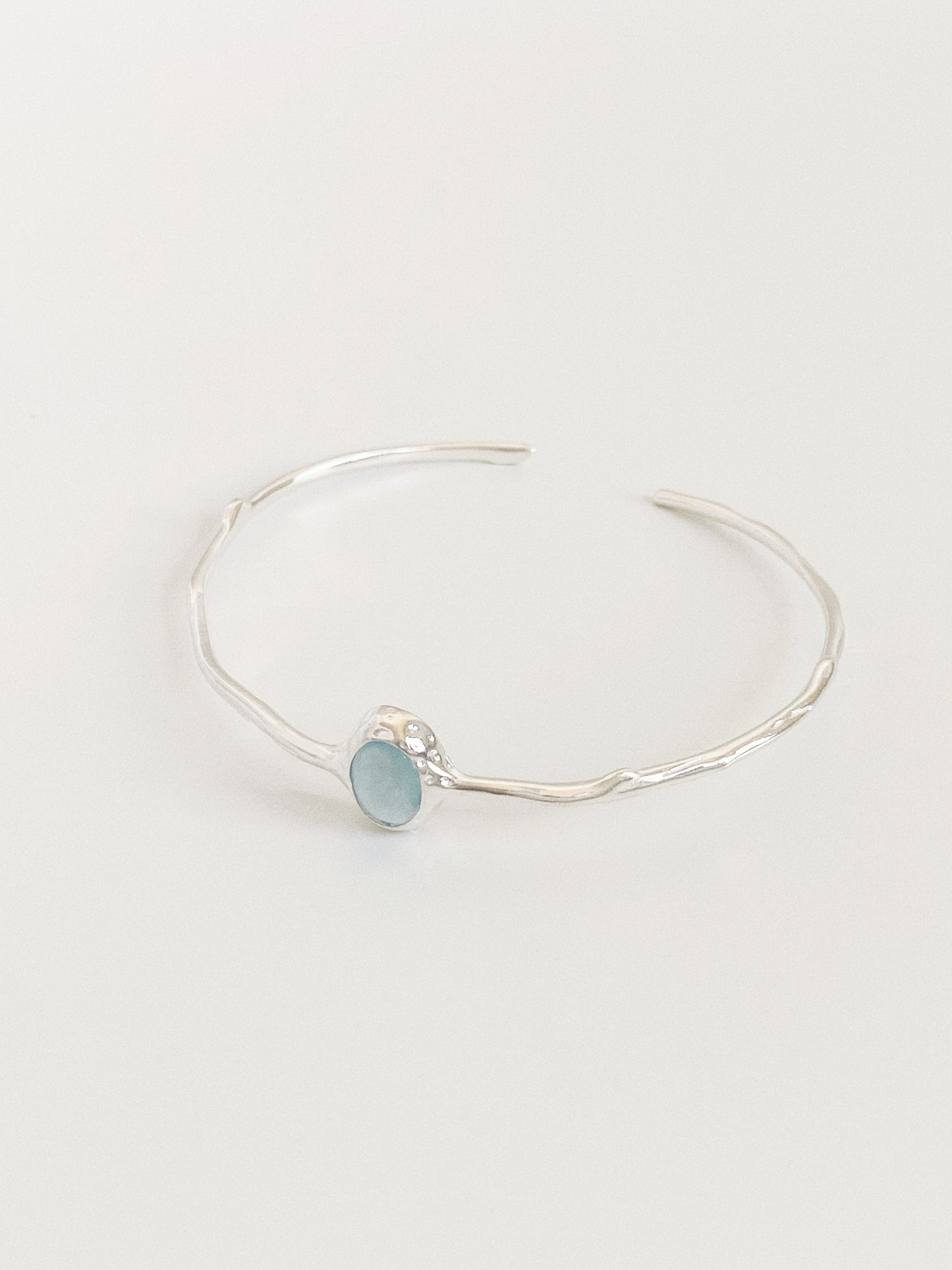 Rivage aquamarine cuff bangle in 925 sterling silver with branch textured band and natural blue gemstone