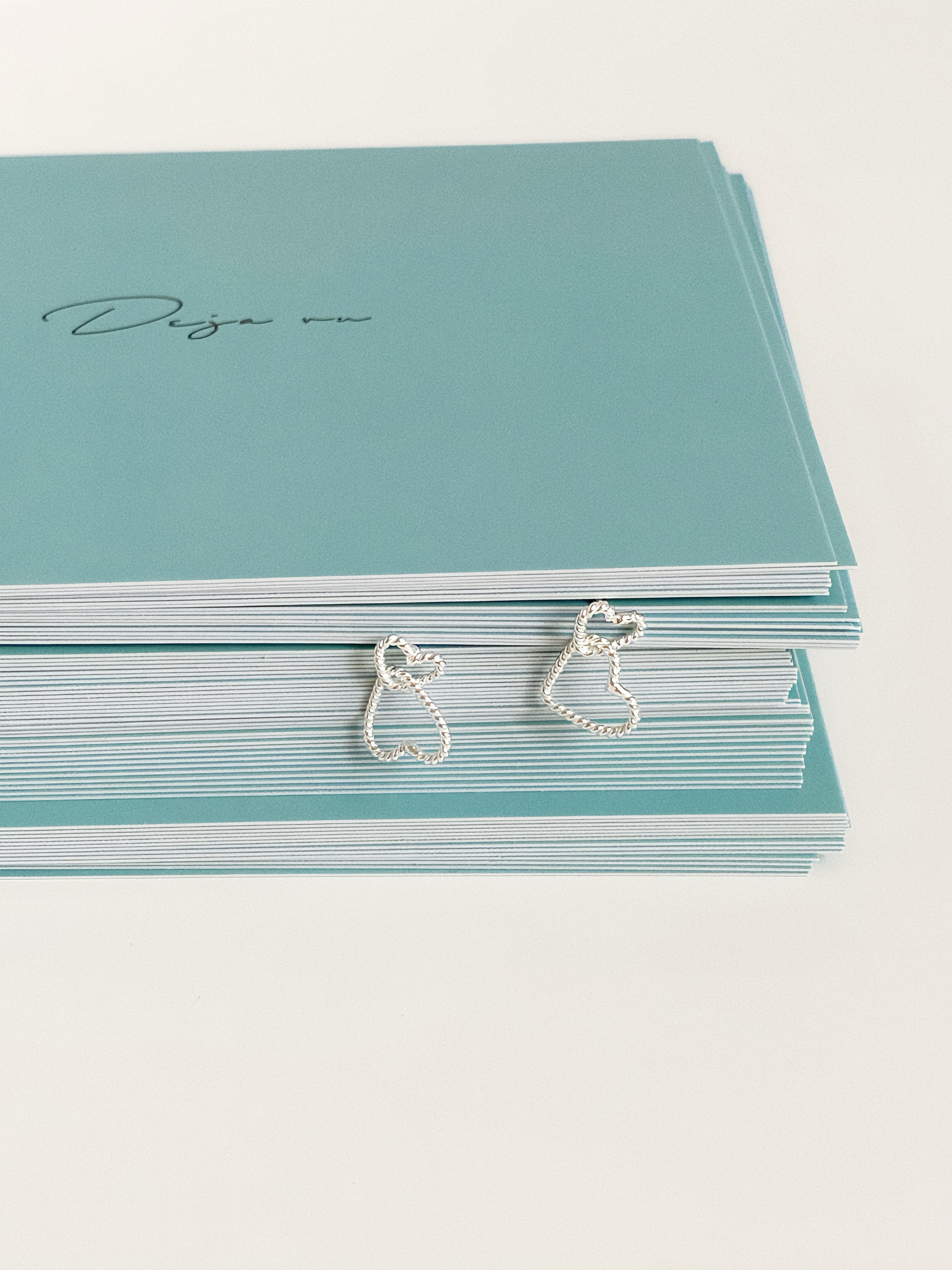 925 sterling silver double heart stud earrings styled with Deja vu Jewellery branded gift packaging