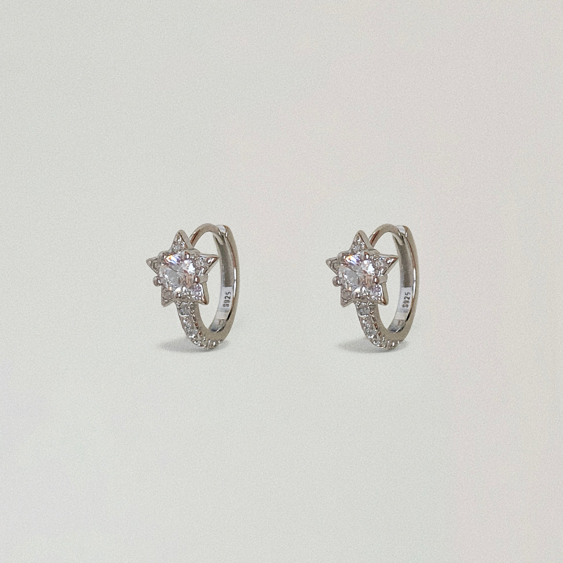 925 Sterling Silver huggie hoop earrings with sparkling star charm, dainty jewellery for women.