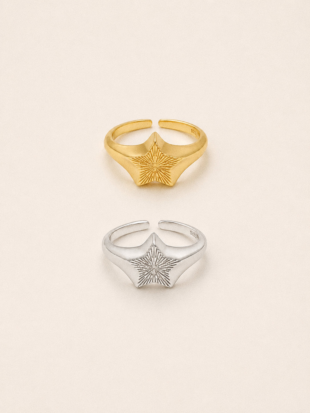 Nova star signet rings in 18k gold plated and sterling silver, engraved sunburst stars on open adjustable bands.