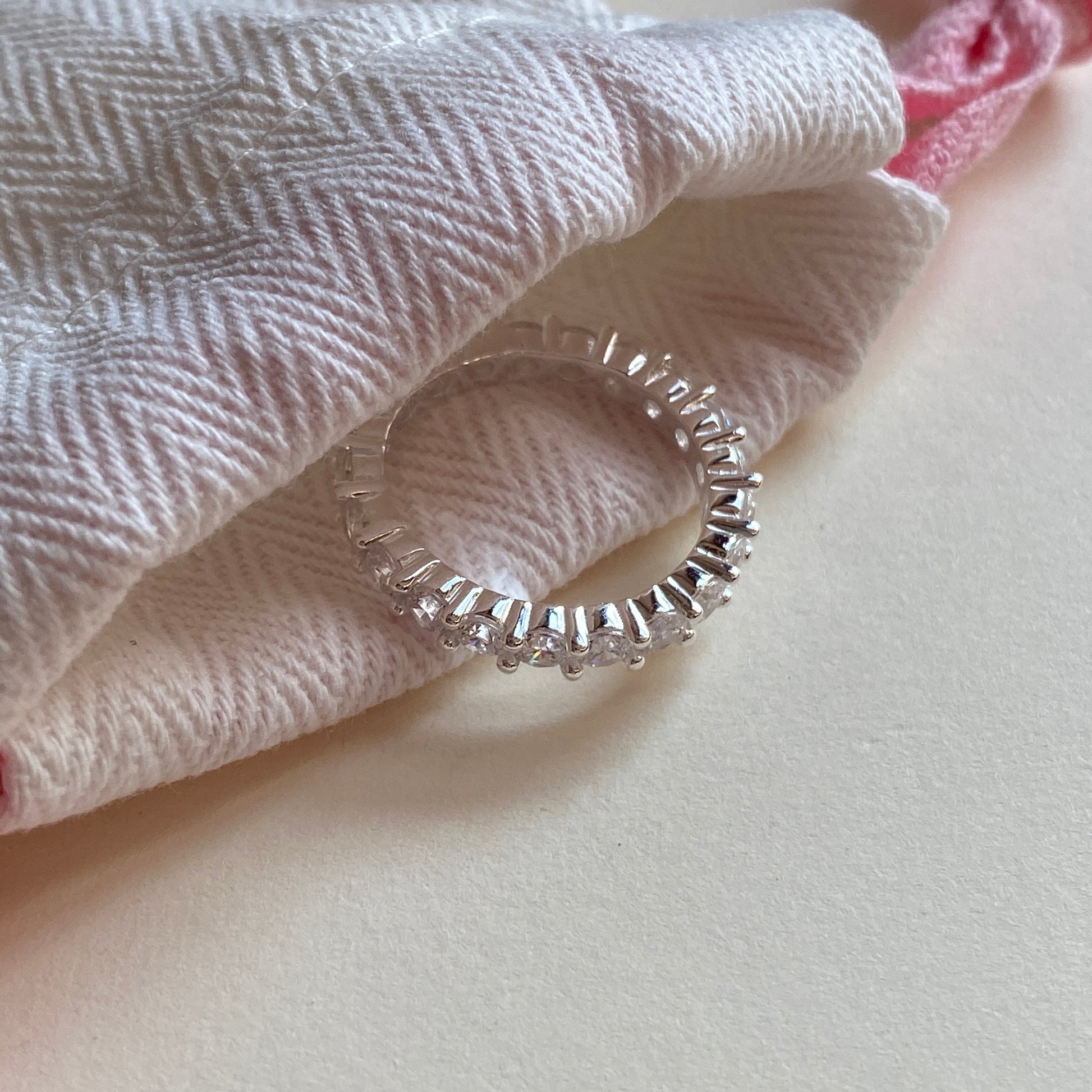 Underside gallery view of sterling silver ring prongs.