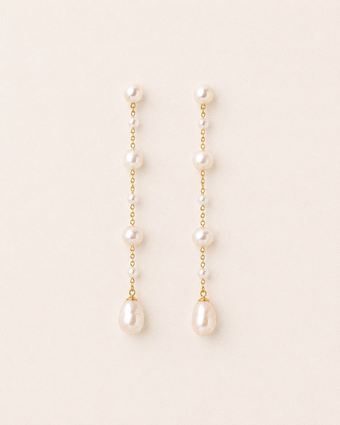 Sway long freshwater pearl drop earrings in 18K gold-plated sterling silver with oval, petite and teardrop pearls.