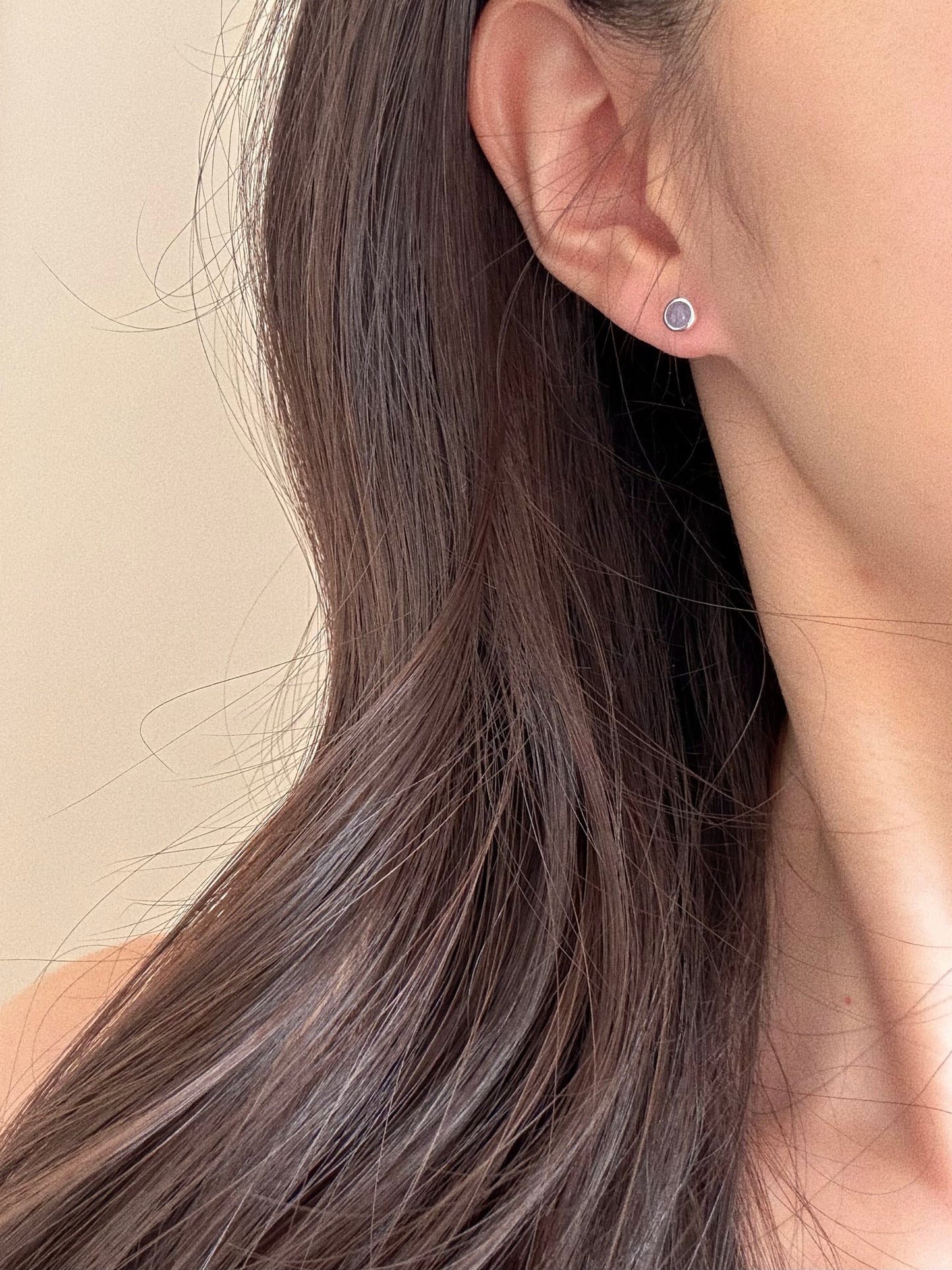 Model wearing the Tanzanite bubble stud earrings, showing how they look with everyday styling.