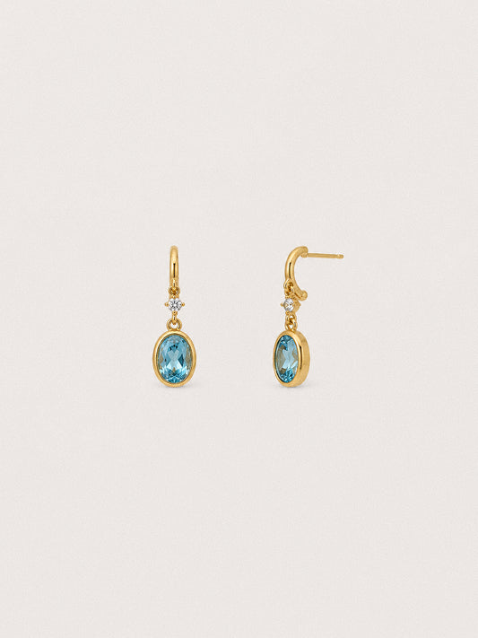 Tide Swiss blue topaz drop earrings in gold-plated 925 sterling silver with oval stones and clear accents.