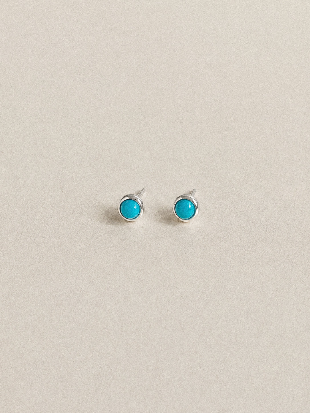 Dream turquoise stud earrings in 925 sterling silver, sky blue Sleeping Beauty stones in smooth bezels.