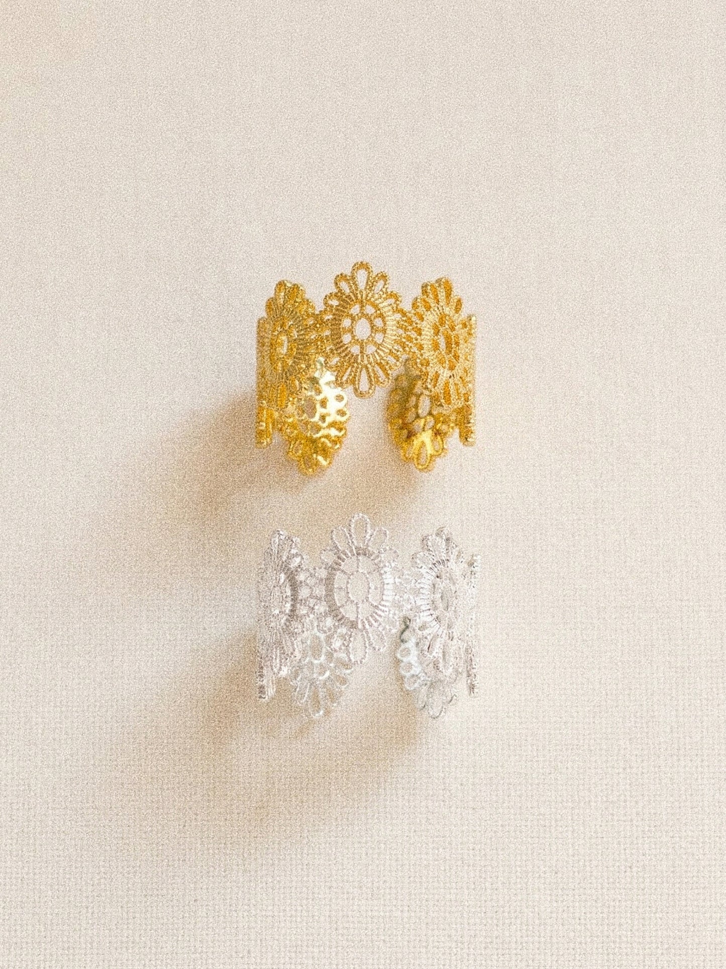 Vintage lace floral adjustable ring in gold and silver finishes flat lay by Deja Vu Jewellery