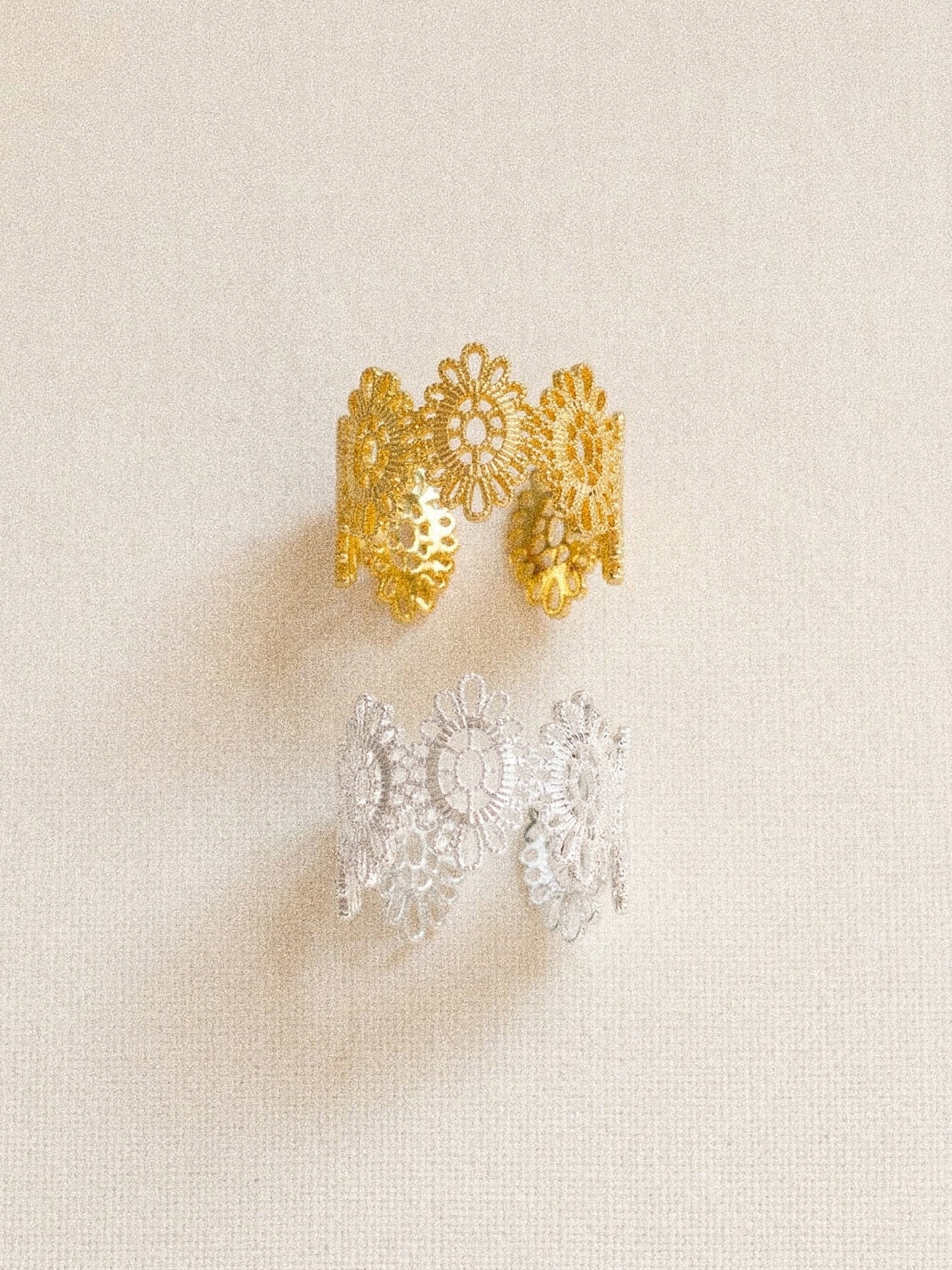 Vintage lace floral adjustable ring in gold and silver finishes flat lay by Deja Vu Jewellery