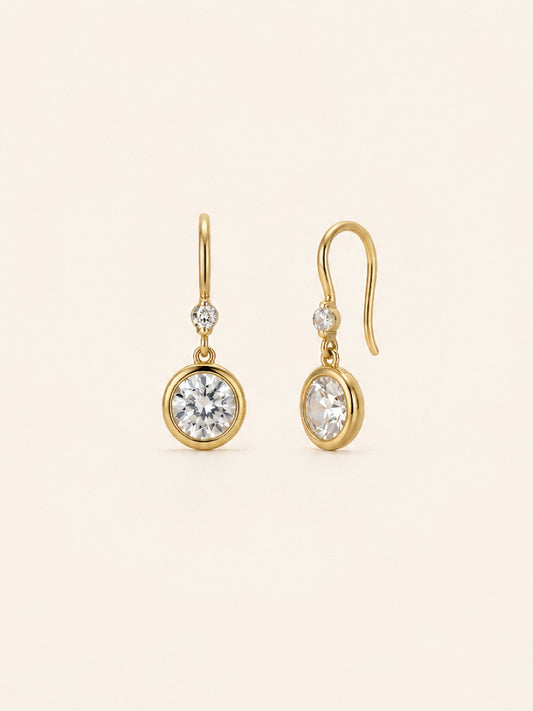 Aura waterproof drop earrings with bezel set cubic zirconia and a small accent stone on 18k gold hooks