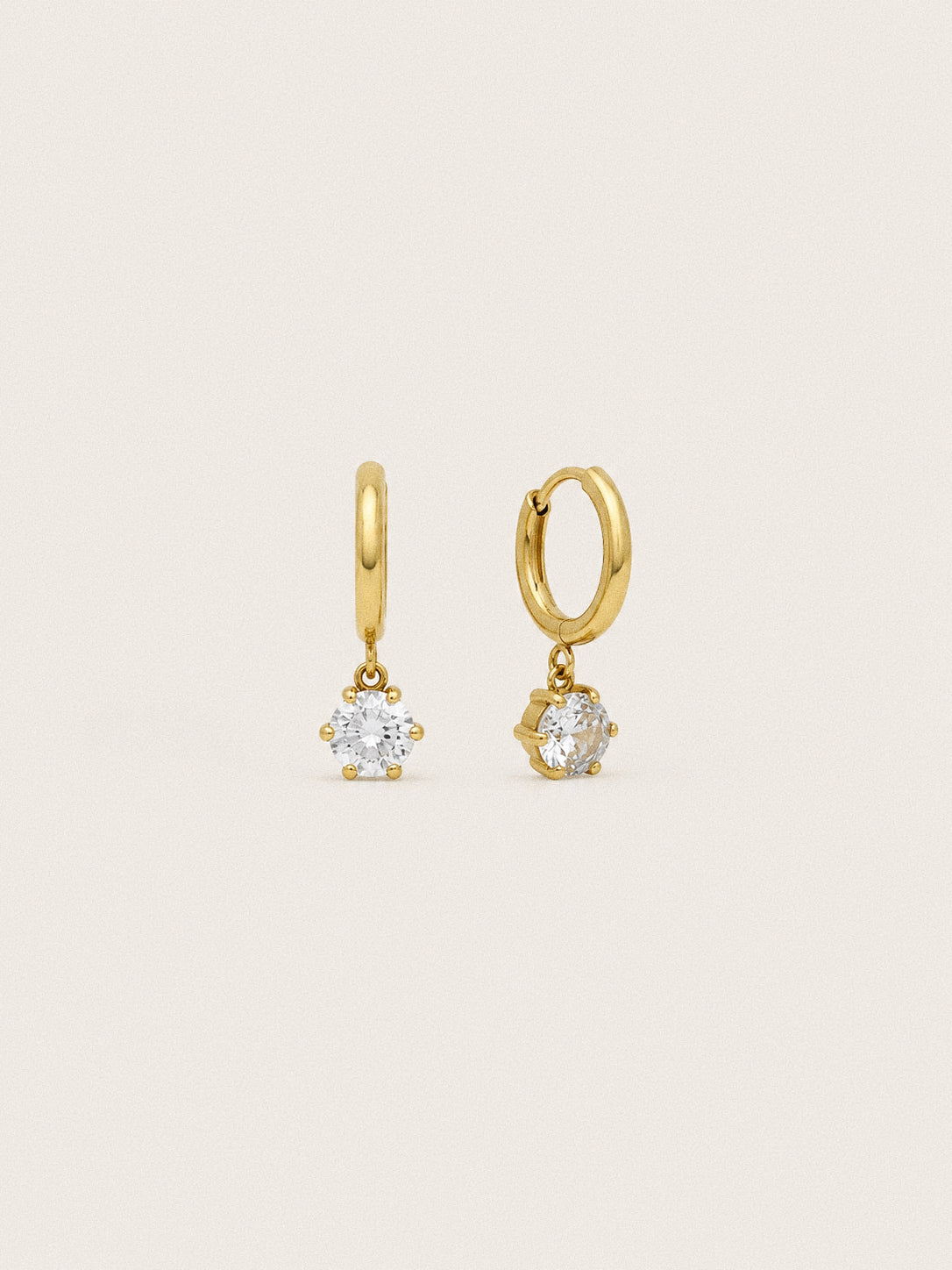 Icon waterproof huggie hoop earrings with six claw round cubic zirconia drops in 18k gold plated steel